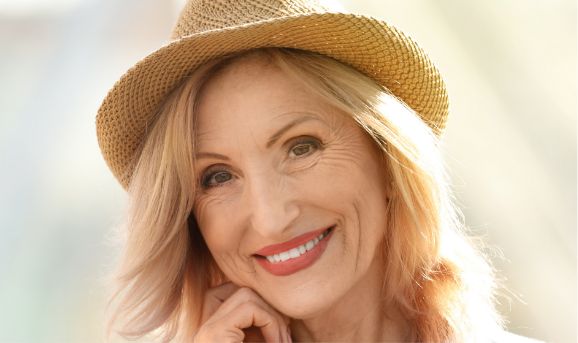 Senior woman smiling outdoors