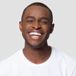 Man smile after gum bleaching