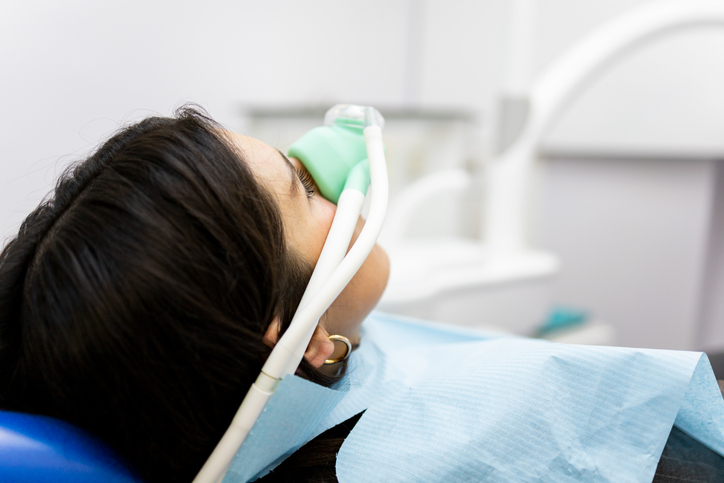 woman consciously sedated for dental services with nitrous oxide